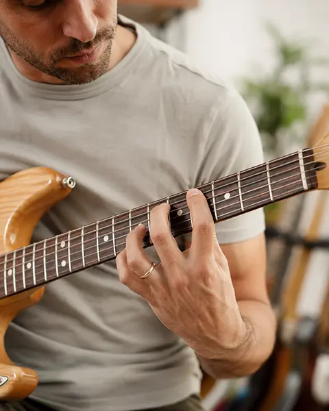 Fretting hand guitar warmup exercises
